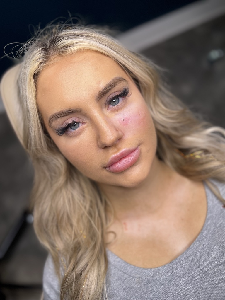 Faux freckle application — soft placement on cheek, The Brow Babes Louisville